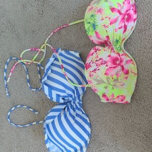 Two Victoria Secret Bikini Tops.